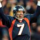 Denver Broncos quarterback John Elway celebrates a